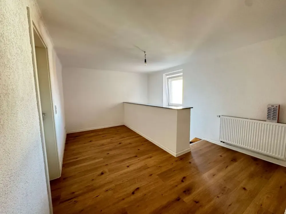 Modern Renovated 4-Room Maisonette Apartment with Two Bedrooms in Saarbrücken-Ensheim