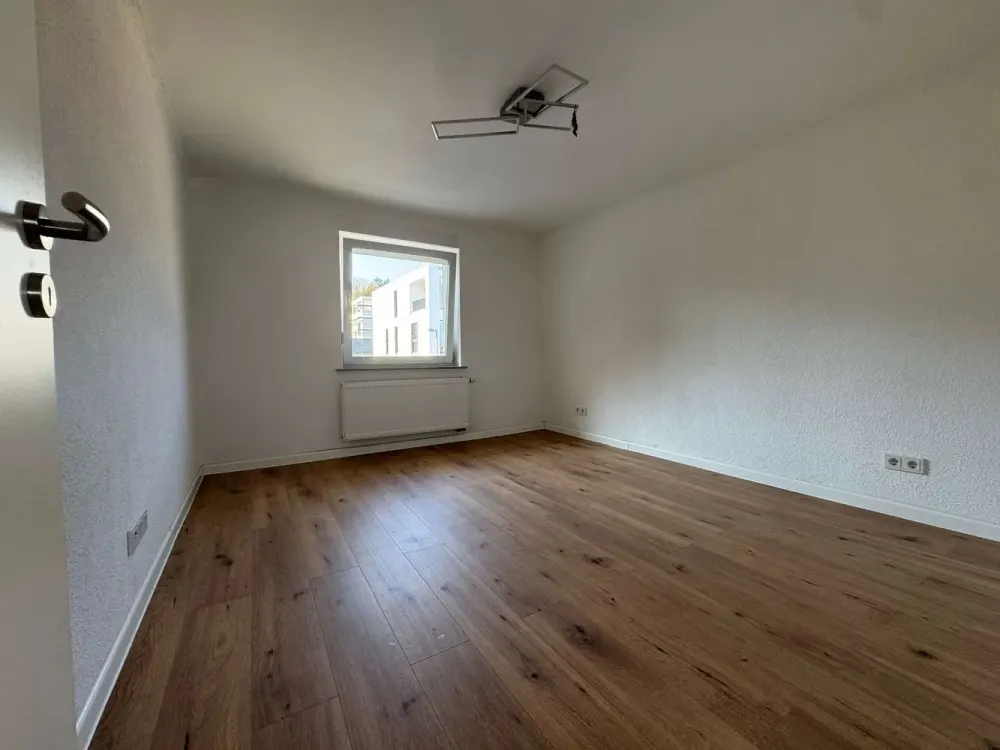 Modern Renovated 4-Room Maisonette Apartment with Two Bedrooms in Saarbrücken-Ensheim