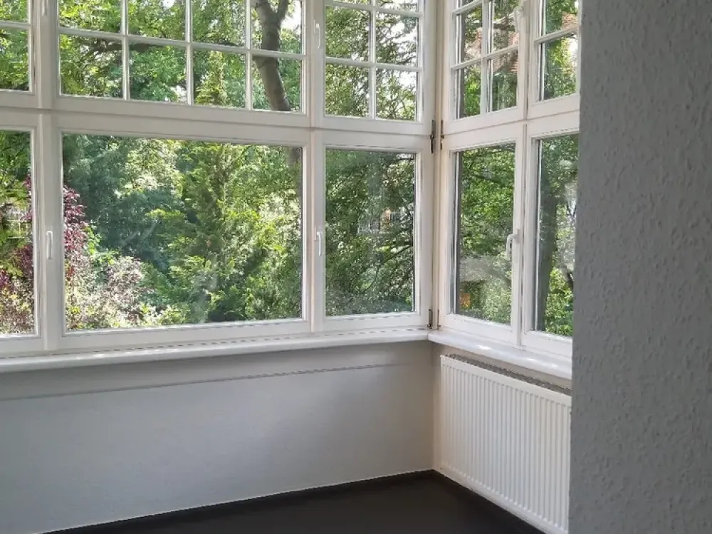 Attraktive 2-Zimmer-Erdgeschosswohnung mit großzügiger Wohnfläche und Wintergarten