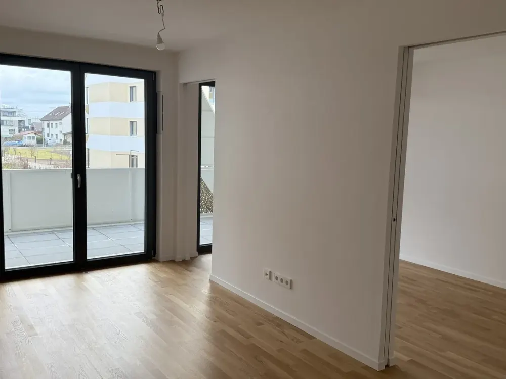 Gemütliche 2-Zimmer Wohnung im 1. Obergeschoss mit Blick in den projekteigenen Park.