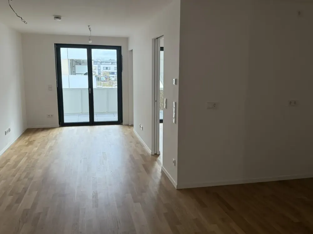 Gemütliche 2-Zimmer Wohnung im 1. Obergeschoss mit Blick in den projekteigenen Park.