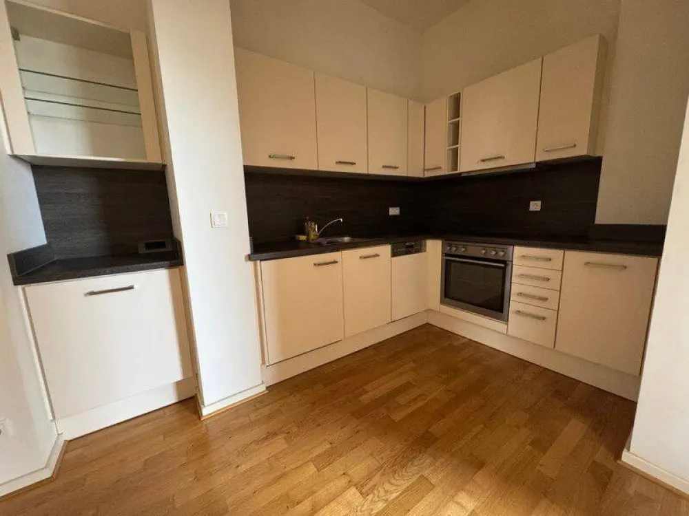 Finally Home: Attractive 2-Room Apartment with Fitted Kitchen and Loggia