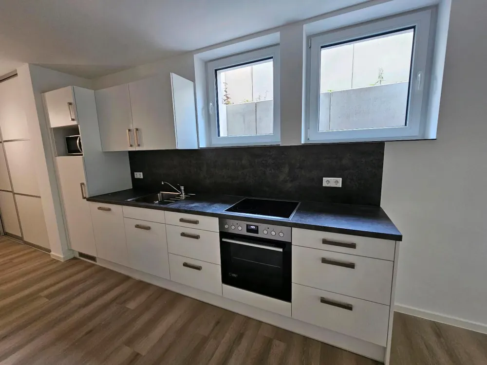 Neubau 1 Z. Wohnung, ca.52m2, Souterrain, mit Einbauküche