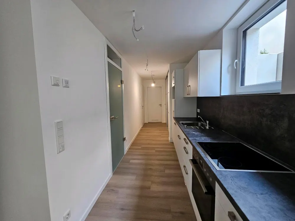 Neubau 1 Z. Wohnung, ca.52m2, Souterrain, mit Einbauküche