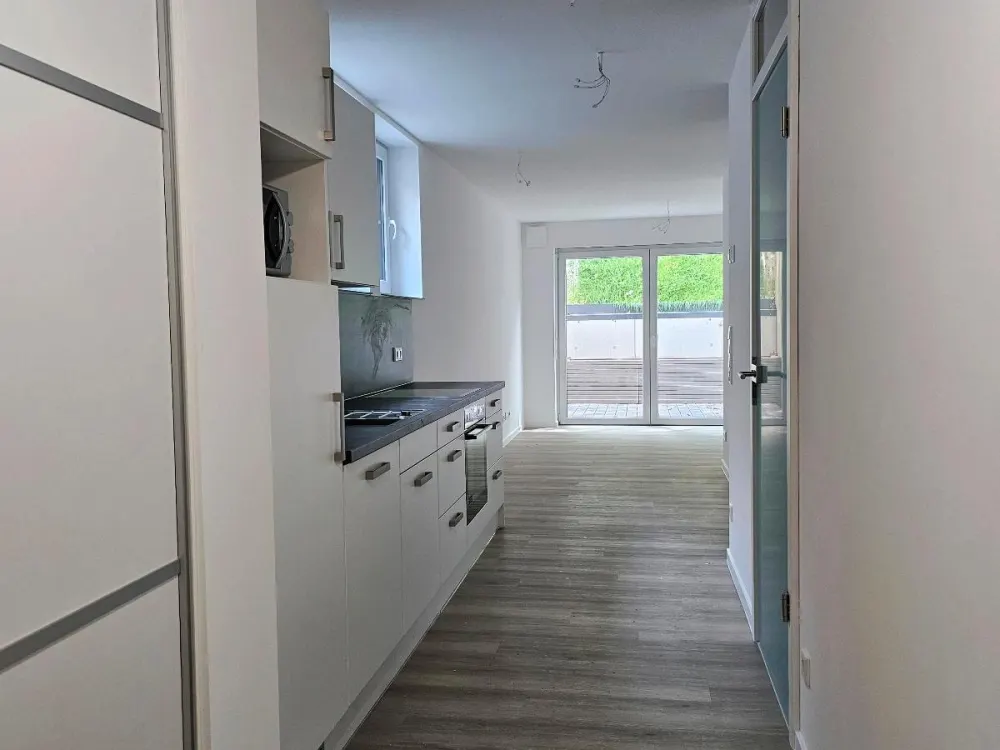 Neubau 1 Z. Wohnung, ca.52m2, Souterrain, mit Einbauküche