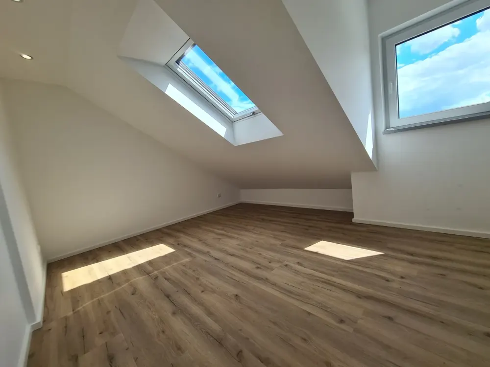 Neubau Erstbezug Helle 2-Zimmer Dachgeschoss mit Balkon Mörfelden
