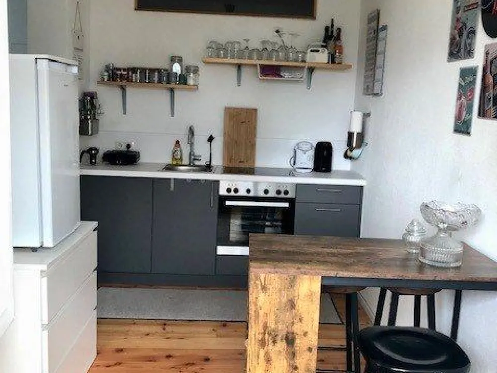 Sonnige 1,5-Zimmer-Wohnung mit Terrasse und Gartenanteil