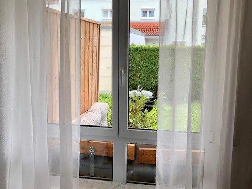 Sonnige 1,5-Zimmer-Wohnung mit Terrasse und Gartenanteil
