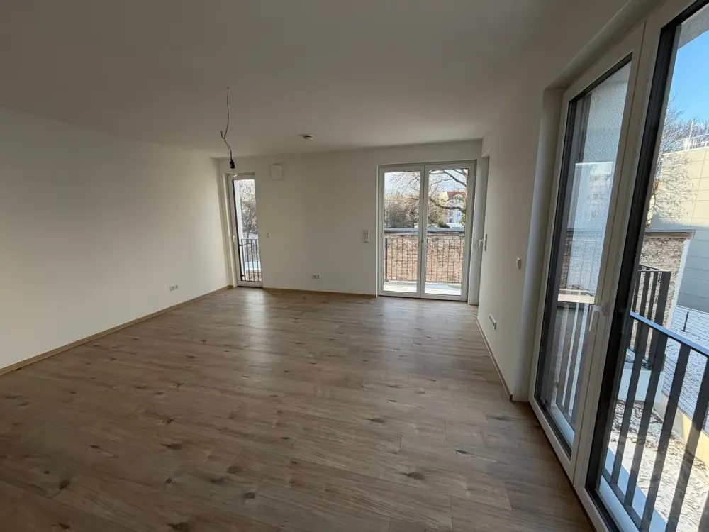 TOP! First occupancy! 2-room apartment with balcony, KFW 40 NH low-energy house, quiet location, 10 min to S-Bahn!