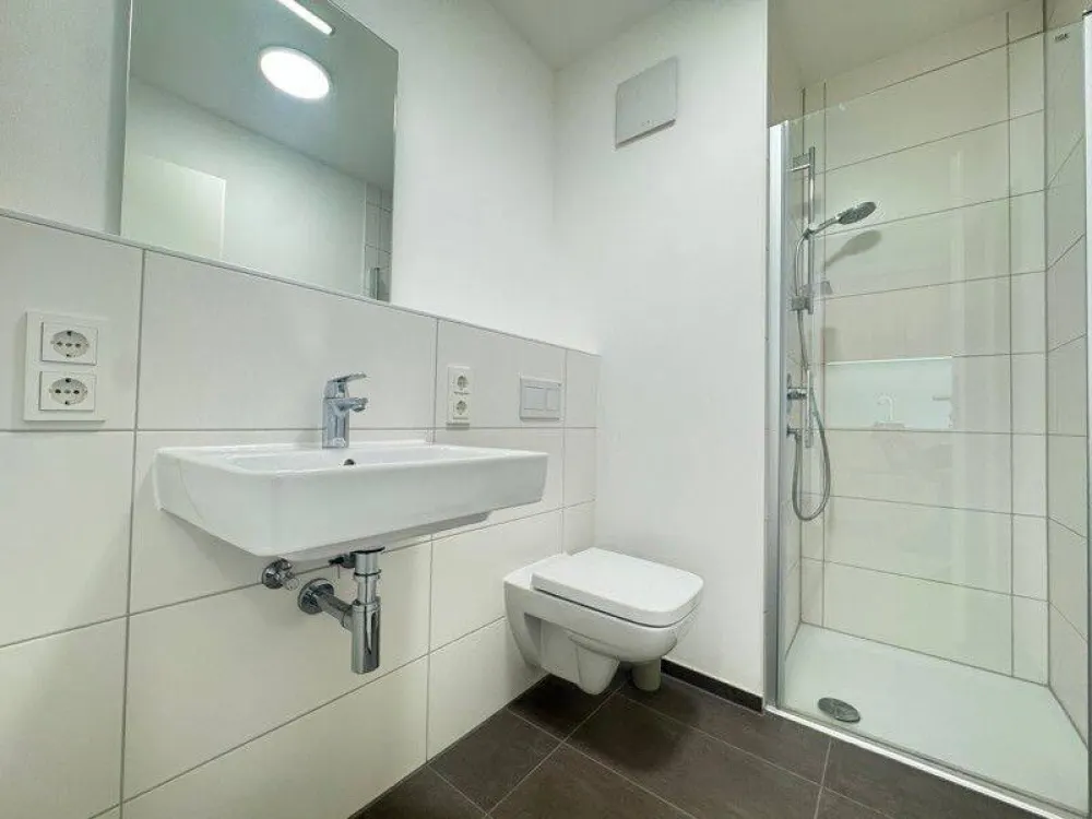 Exklusives 1-Zimmer-Neubauapartment - stilvoll vollmöbliert